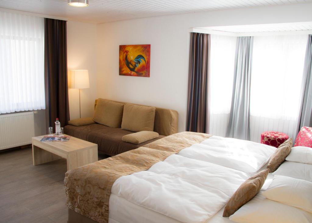 Postel nebo postele na pokoji v ubytování Best Western Plus Schwarzwald Residenz