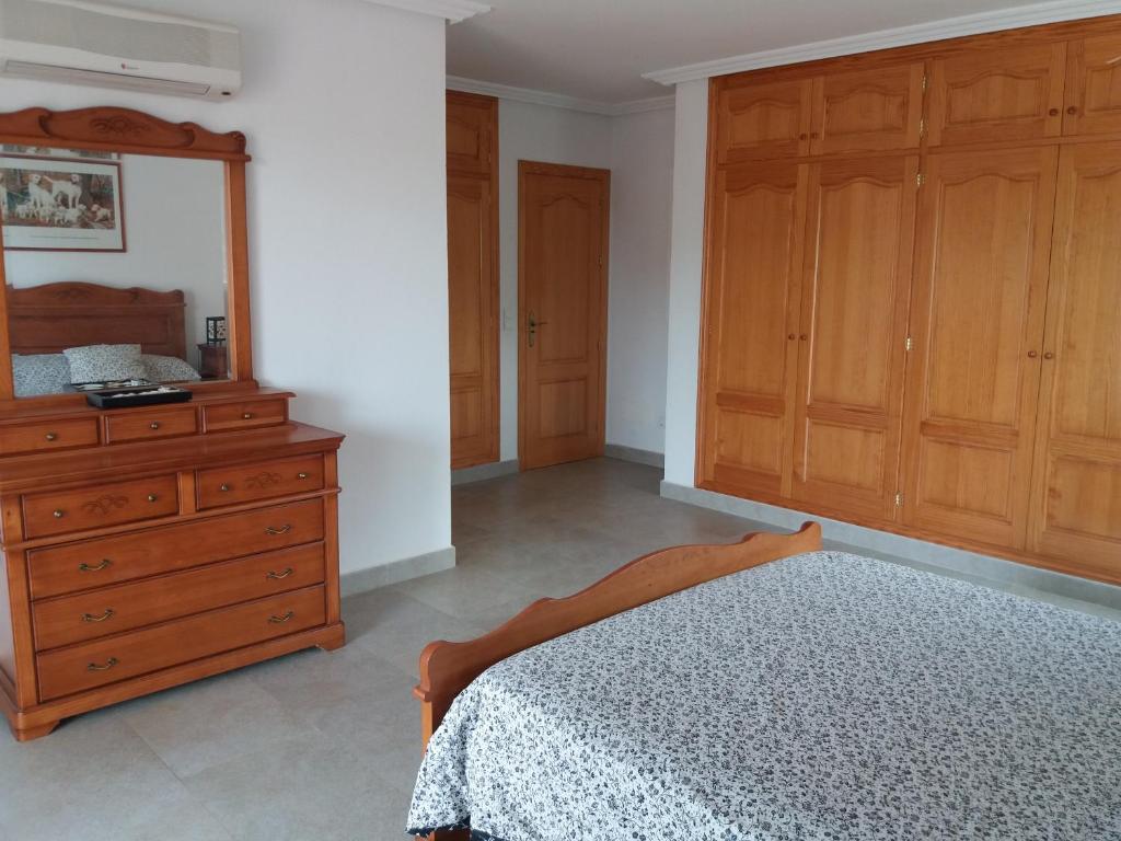 Postel nebo postele na pokoji v ubytování Villa Can Toni Miquelí