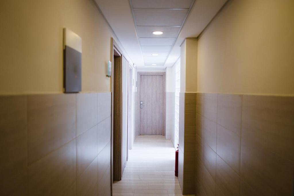 TV a/nebo společenská místnost v ubytování Piraeus Port Hotel
