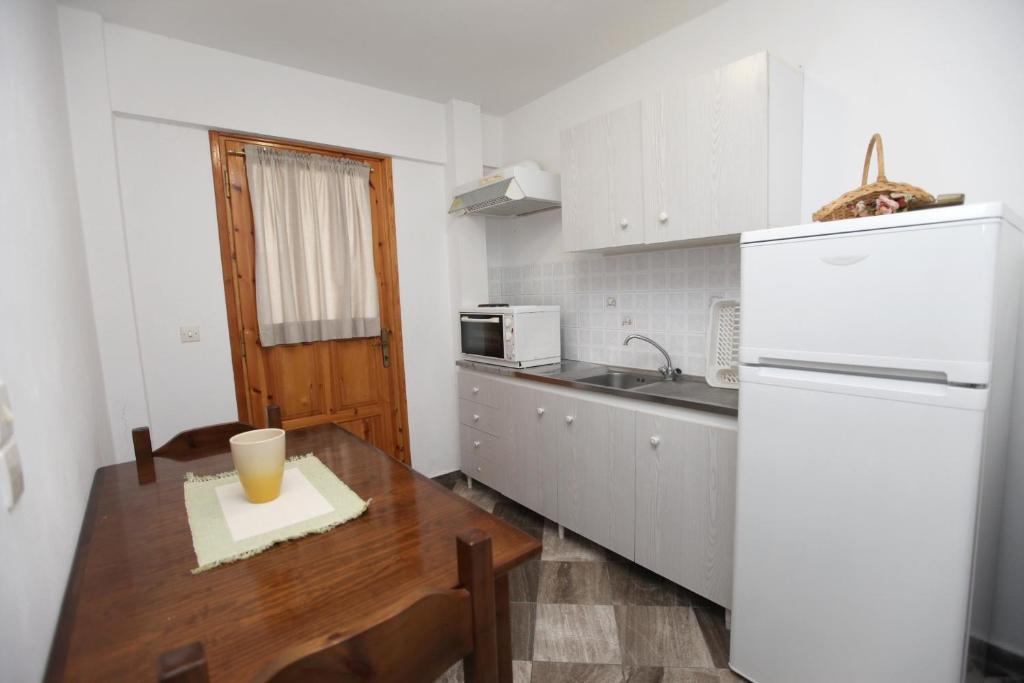 Kuchyň nebo kuchyňský kout v ubytování Sofia Apartments - Kantia
