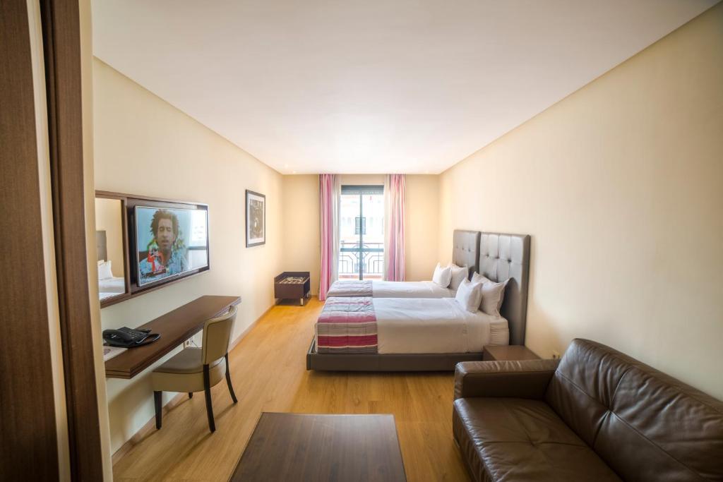 Area soggiorno di Le Rio Appart-Hotel City Center