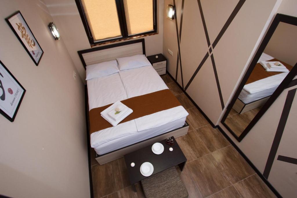 Postel nebo postele na pokoji v ubytování WOW Guest house in apartment 141