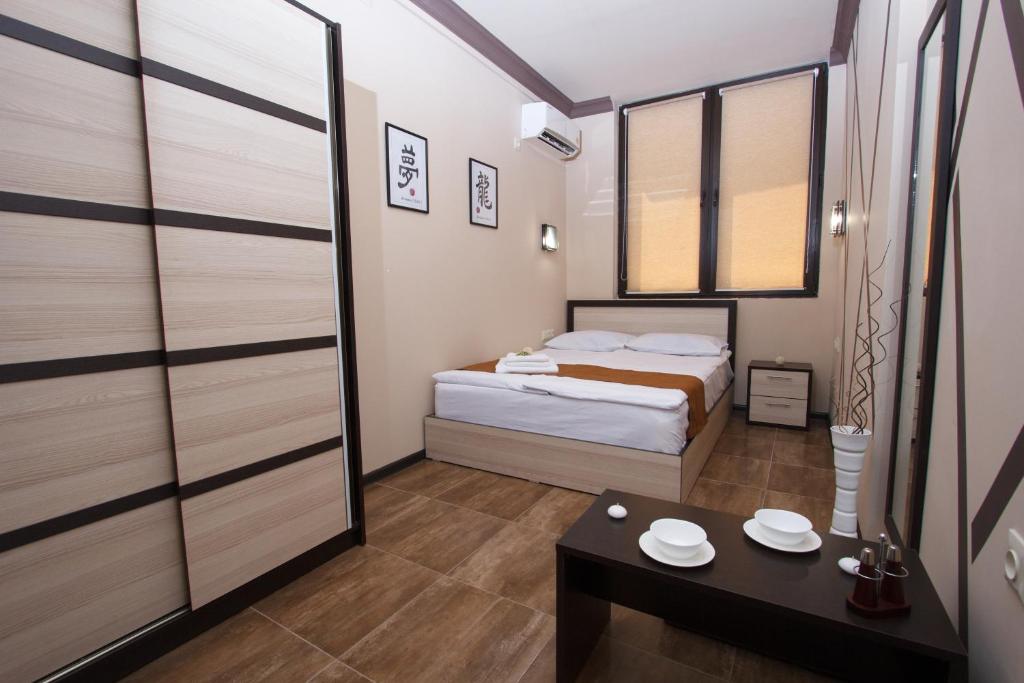 Postel nebo postele na pokoji v ubytování WOW Guest house in apartment 141