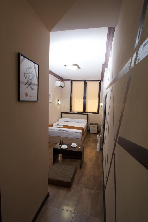 Postel nebo postele na pokoji v ubytování WOW Guest house in apartment 141