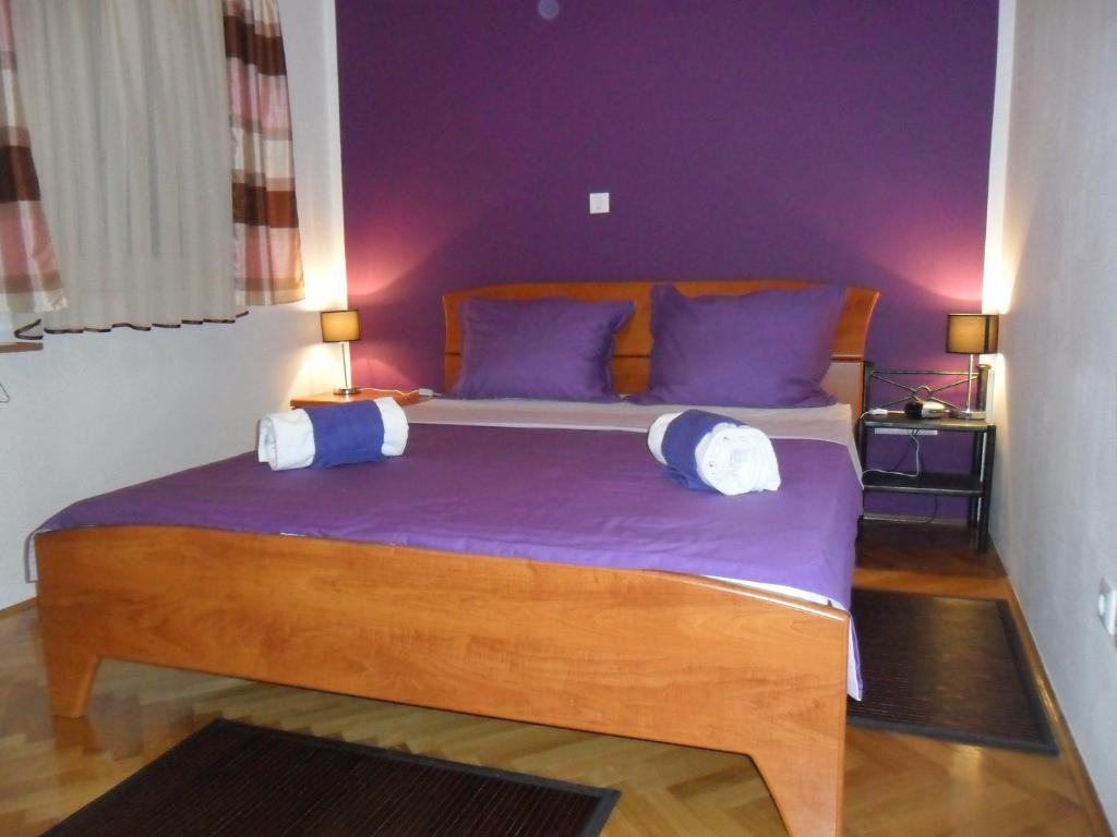 Postel nebo postele na pokoji v ubytování Apartment Ivan