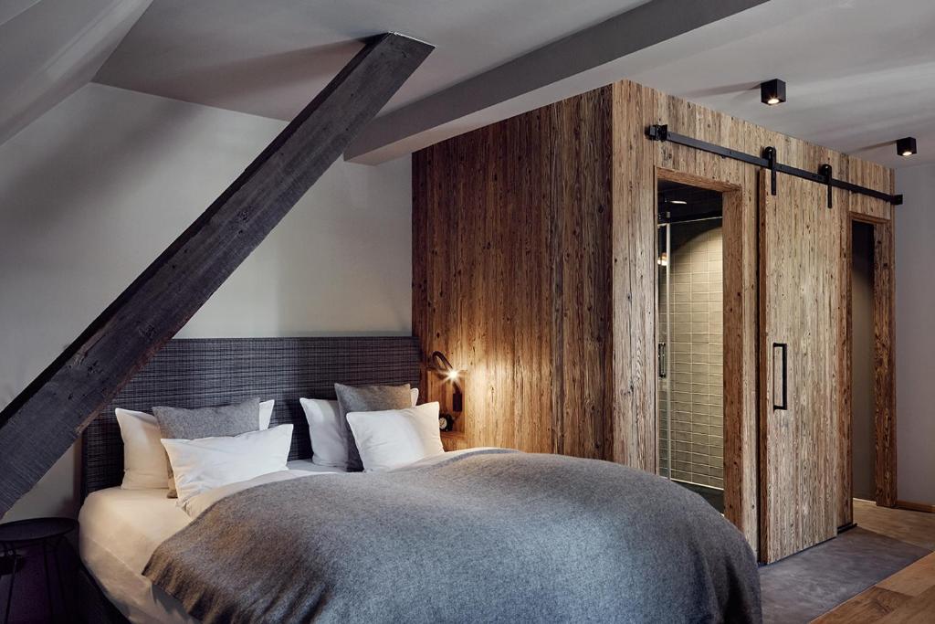 Postel nebo postele na pokoji v ubytování Landhaus Flottbek Boutique Hotel
