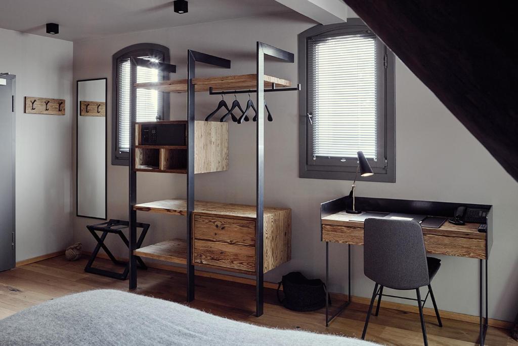 Postel nebo postele na pokoji v ubytování Landhaus Flottbek Boutique Hotel