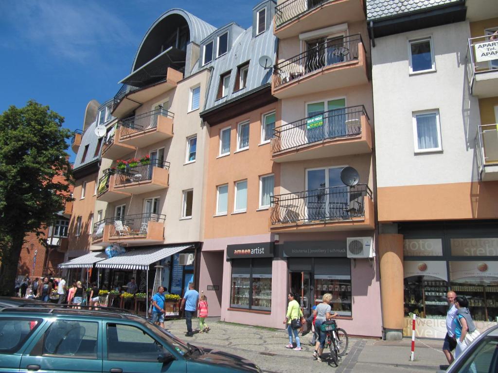 Hostia v ubytovaní Apartament z balkonem przy Latarni 150m od morza
