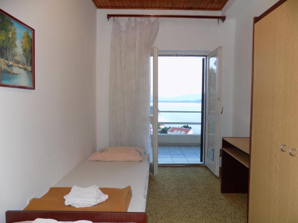 Postel nebo postele na pokoji v ubytování Borovik Guest House