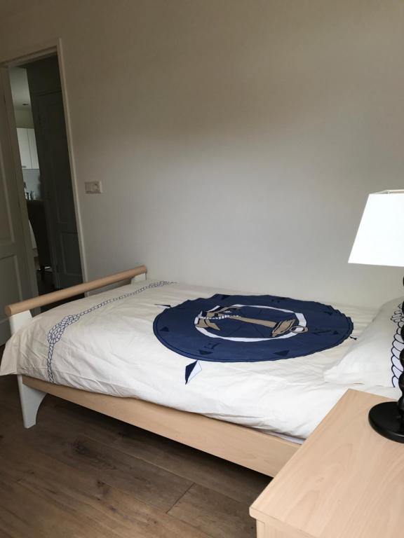 Postel nebo postele na pokoji v ubytování de Goede Ree Huisje 1 en 2