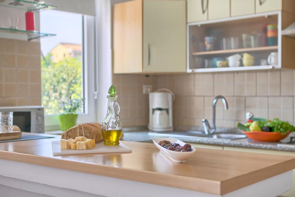 Kuchyň nebo kuchyňský kout v ubytování Holiday Home Nikol