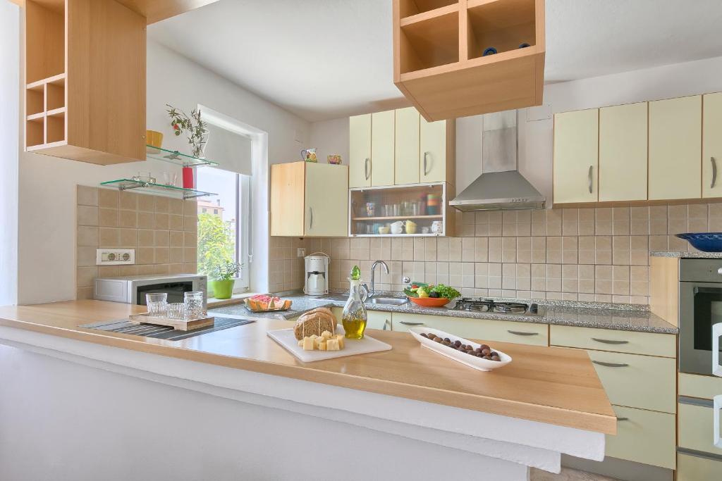 Kuchyň nebo kuchyňský kout v ubytování Holiday Home Nikol