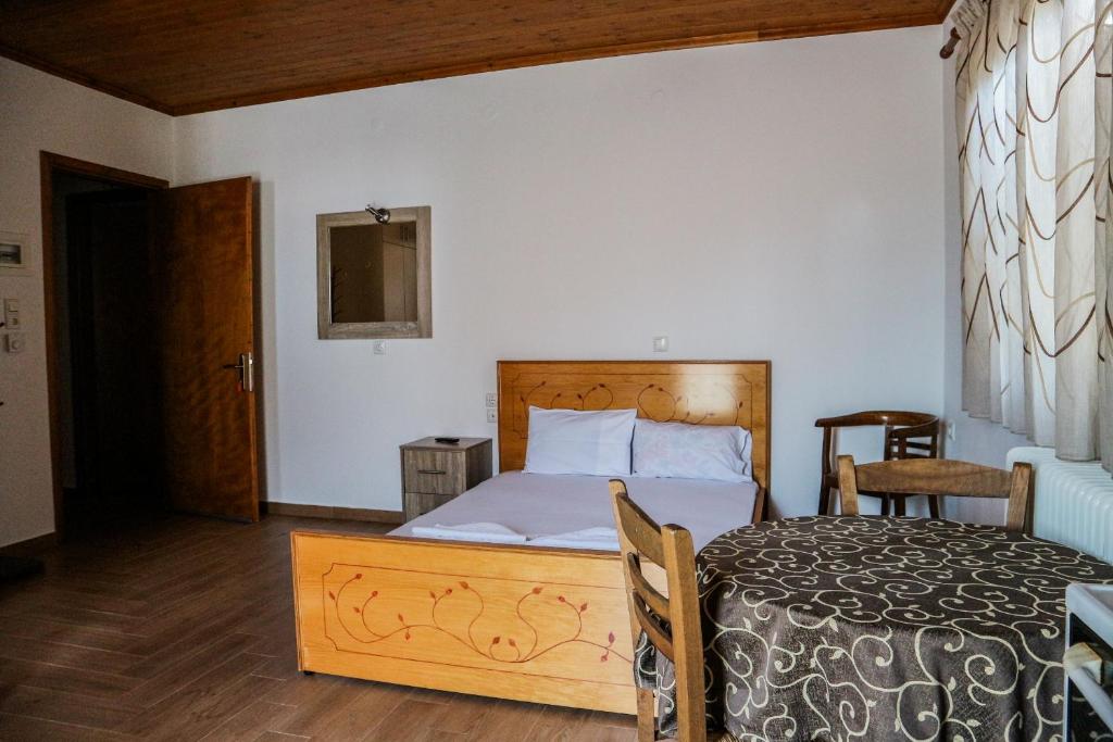 Postel nebo postele na pokoji v ubytování Hotel Elatofilito