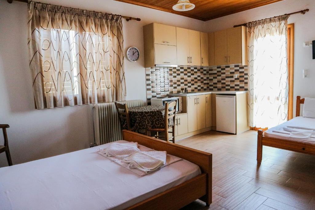 Postel nebo postele na pokoji v ubytování Hotel Elatofilito