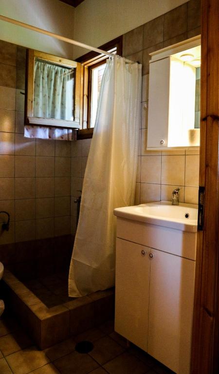 Koupelna v ubytování Hotel Elatofilito