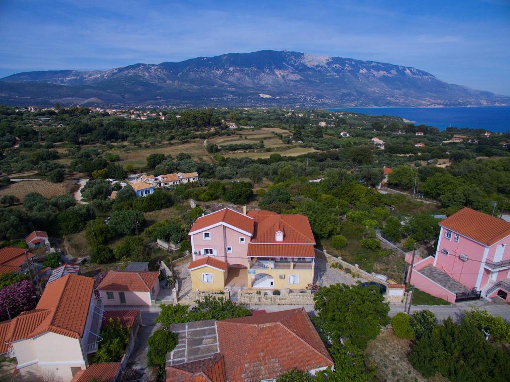 an aerial view of a town with houses and a mountain at Kazarma Apartments at Klismata village in Klísmata
