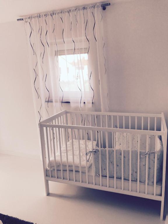 Postel nebo postele na pokoji v ubytování Apartmani Beril Lux