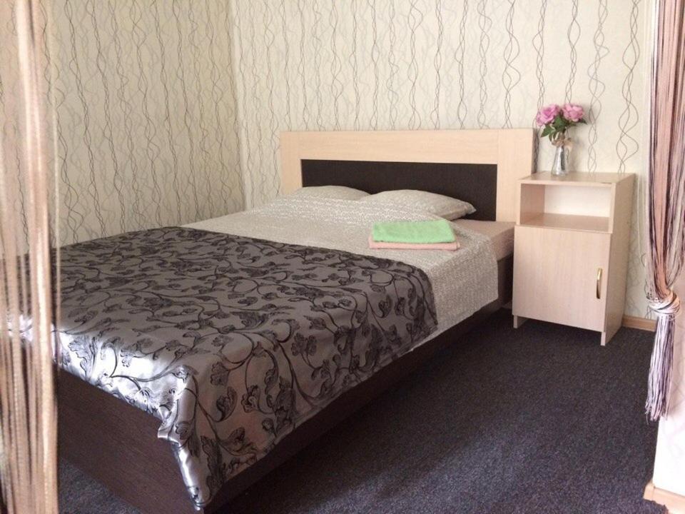 Кровать или кровати в номере 1-room Apartment near Kristal