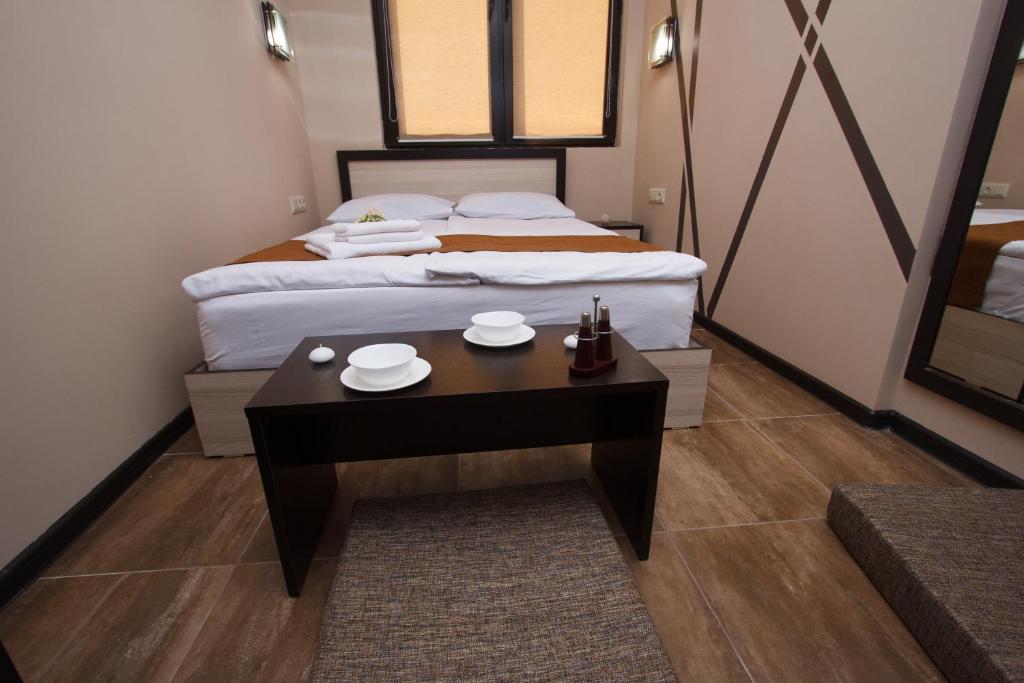 Postel nebo postele na pokoji v ubytování WOW Guest house in apartment 141