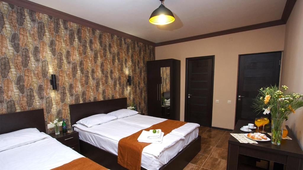 Postel nebo postele na pokoji v ubytování WOW Guest house in apartment 141