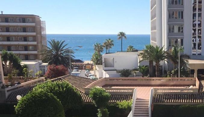 a view of a city with the ocean and buildings at Apartment Erisa in Torremolinos
