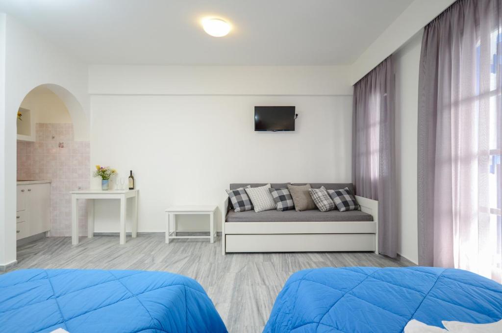 A bed or beds in a room at Soula Naxos