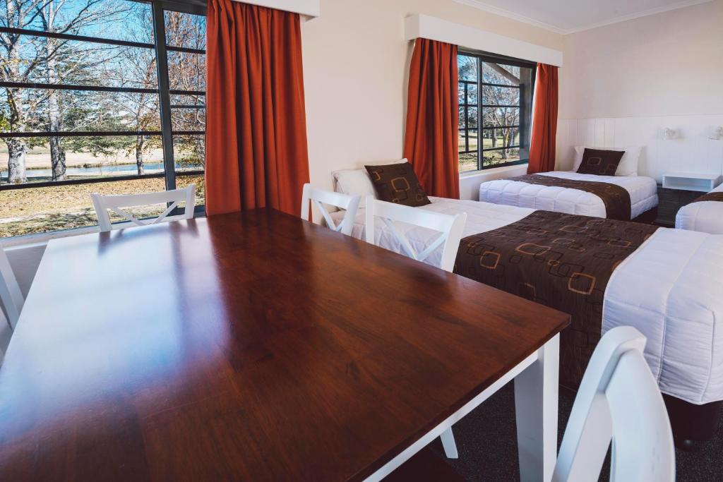 Postel nebo postele na pokoji v ubytování Boulevard Motel