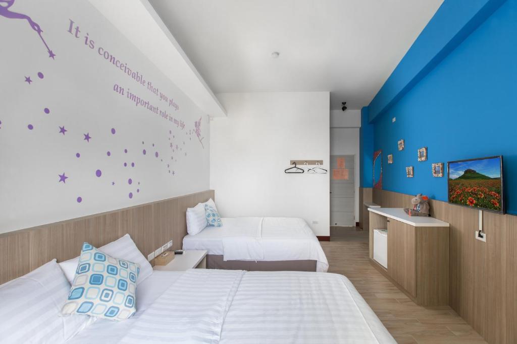 Postel nebo postele na pokoji v ubytování Sanwu Homestay