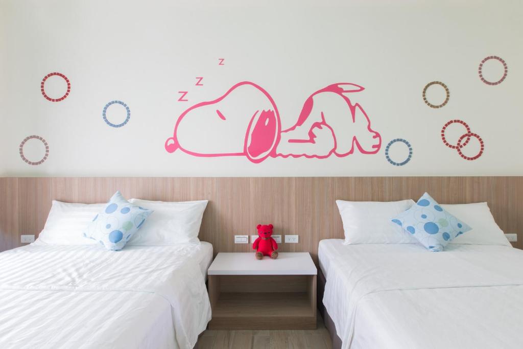 Postel nebo postele na pokoji v ubytování Sanwu Homestay