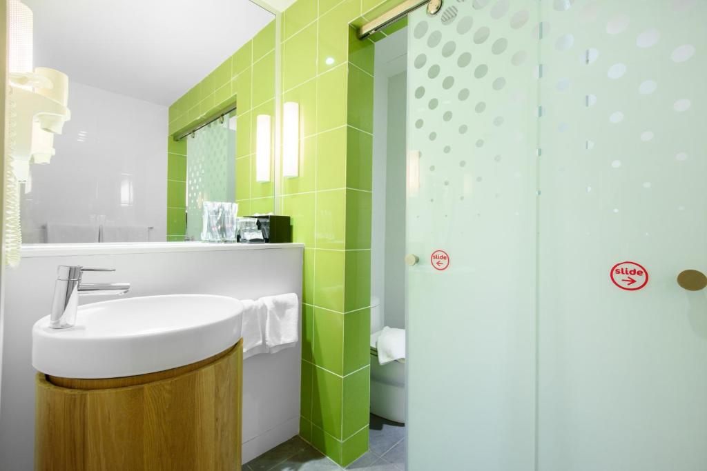 Koupelna v ubytování MU Hotel