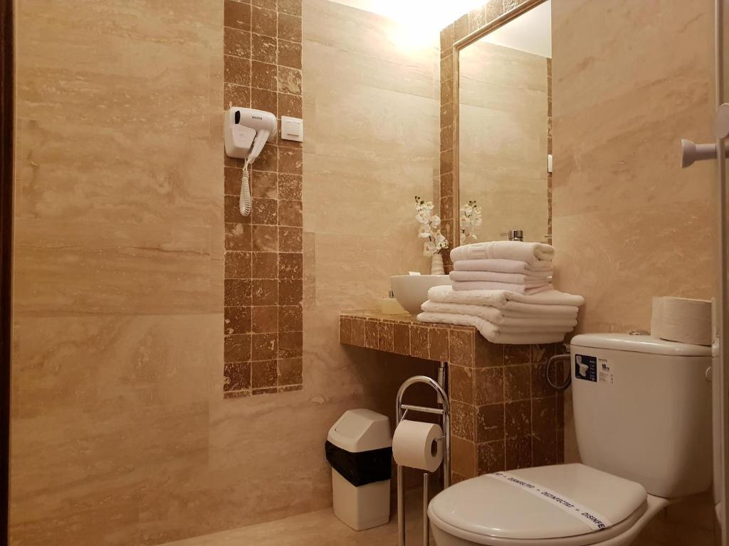 Koupelna v ubytování Hotel Tomis