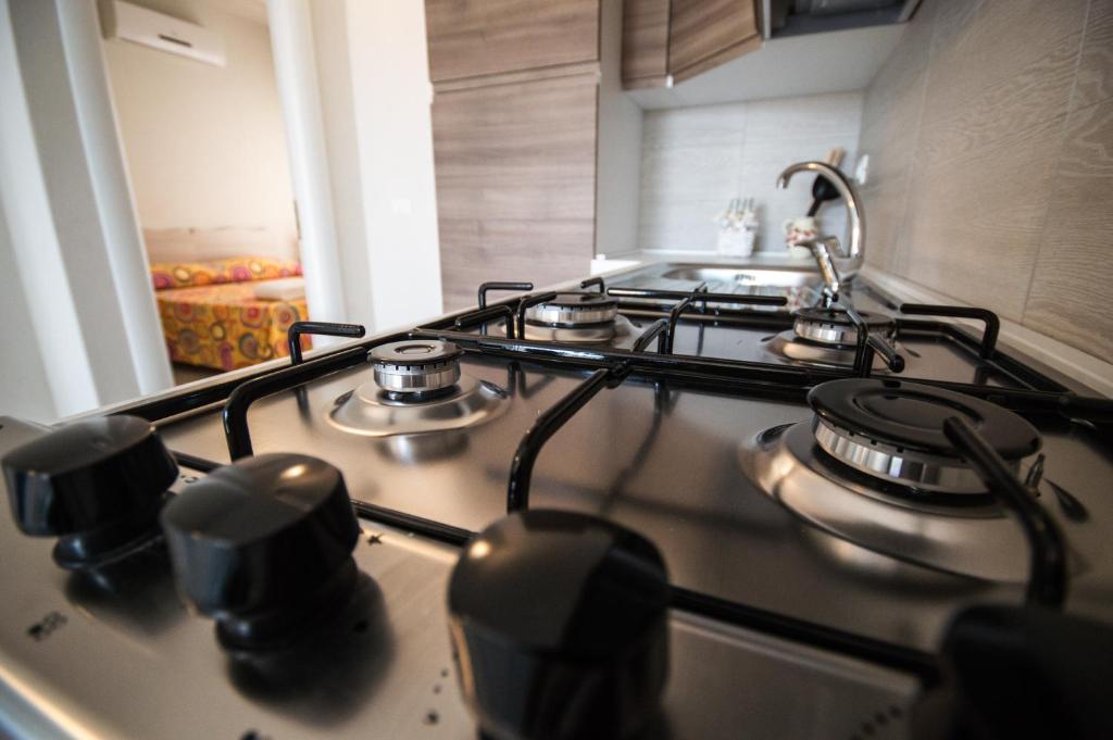 Kuchyň nebo kuchyňský kout v ubytování Edonè B&B