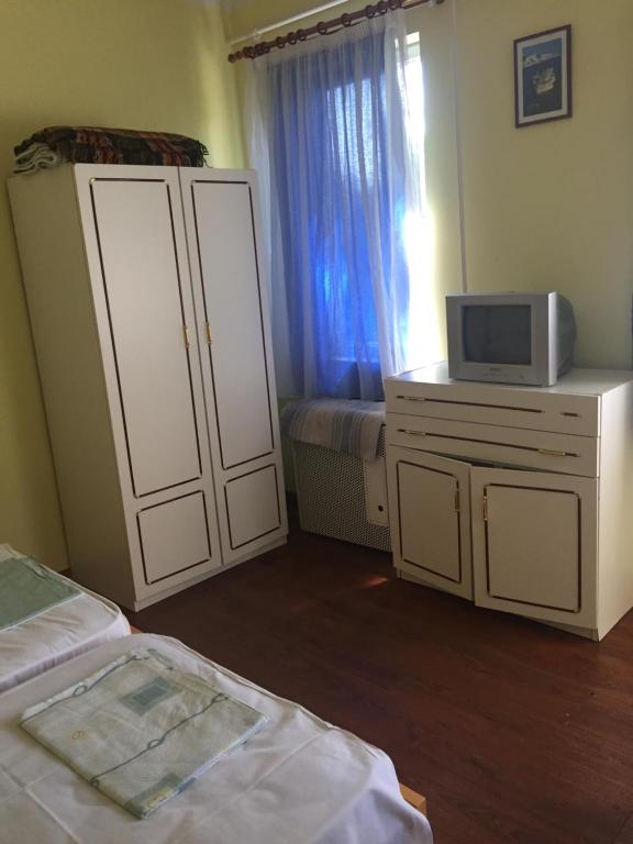Postel nebo postele na pokoji v ubytování Matróz Siófok