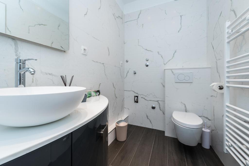 Koupelna v ubytování Apartments Ena