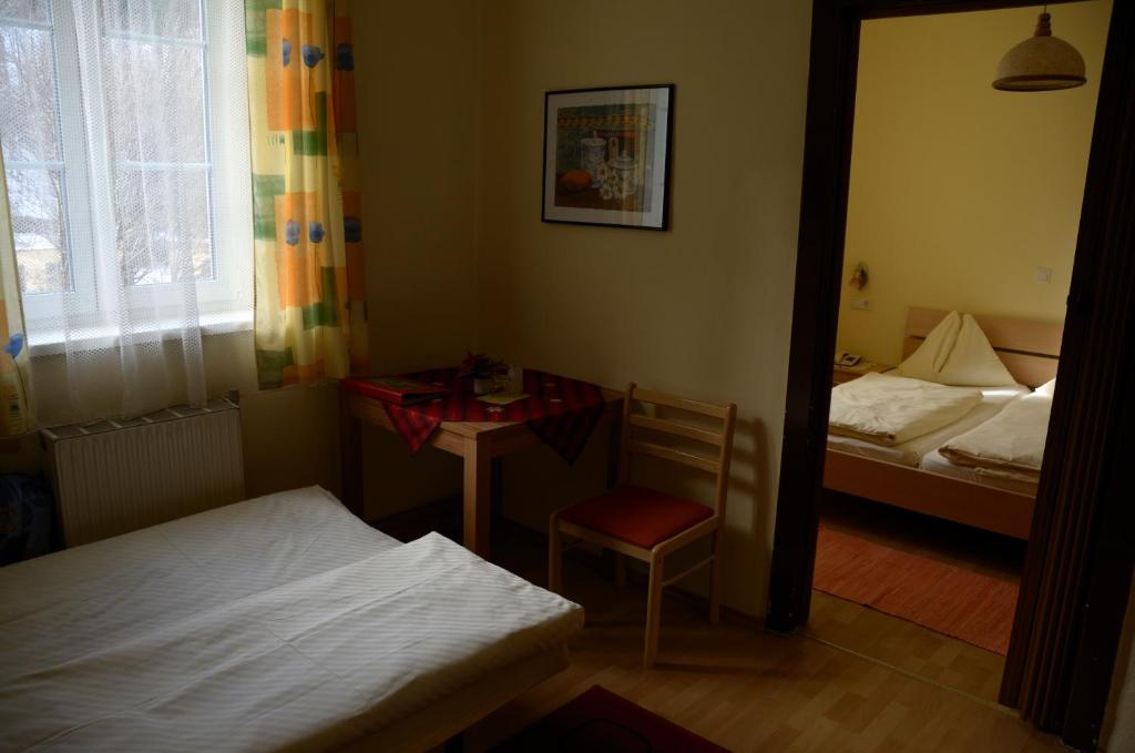 Posteľ alebo postele v izbe v ubytovaní Eisenerzer Hof