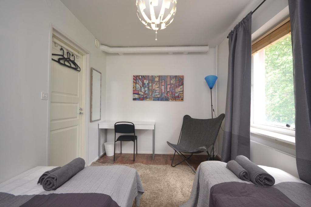 Postel nebo postele na pokoji v ubytování Motel Tornio