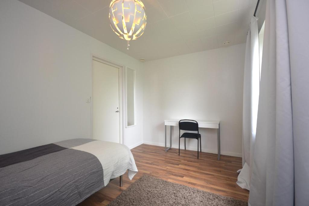 Postel nebo postele na pokoji v ubytování Motel Tornio