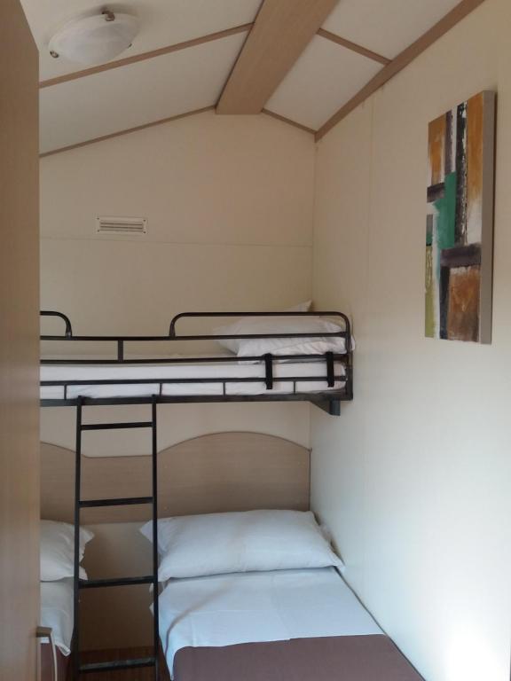 Łóżko lub łóżka w pokoju w obiekcie Private Bay Residence