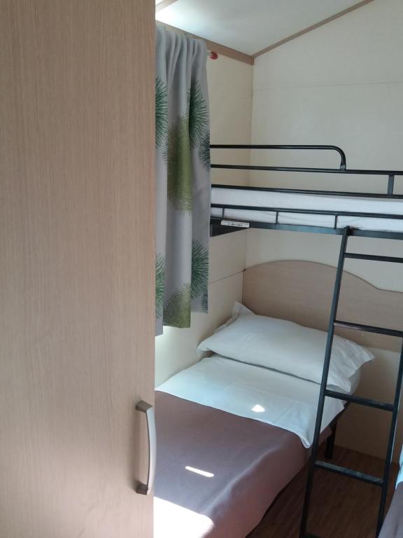 Łóżko lub łóżka w pokoju w obiekcie Private Bay Residence