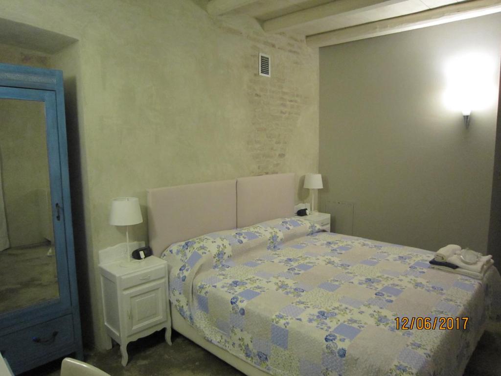 Postel nebo postele na pokoji v ubytování Casa Torre Allera