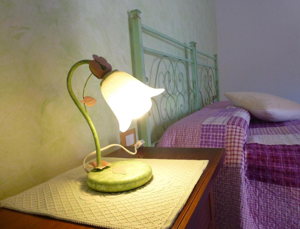 Postel nebo postele na pokoji v ubytování B&B Su Frascu Segau