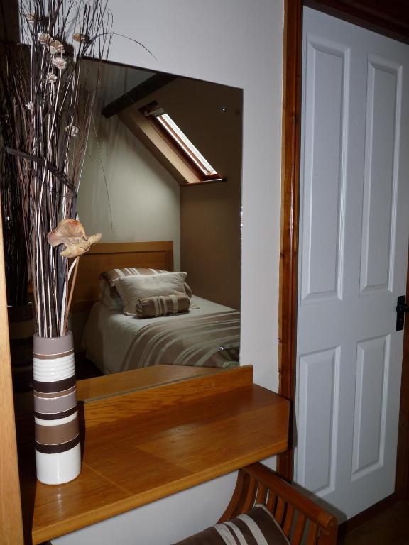 Postel nebo postele na pokoji v ubytování Stirabout Lane B&B