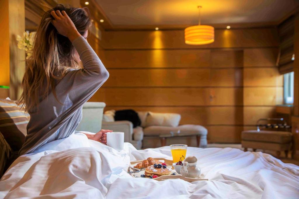 Postel nebo postele na pokoji v ubytování Lahoya Suites