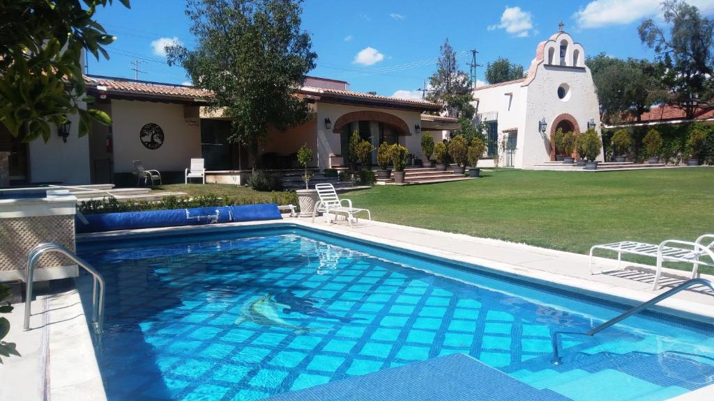 Bazén v ubytování Hotel Regalo del Alma nebo v jeho okolí