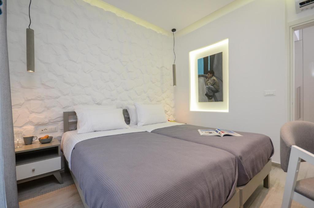 Postel nebo postele na pokoji v ubytování Elegant Apartments