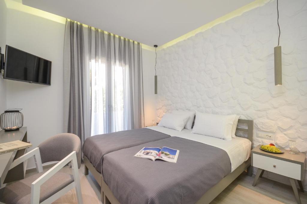 Postel nebo postele na pokoji v ubytování Elegant Apartments