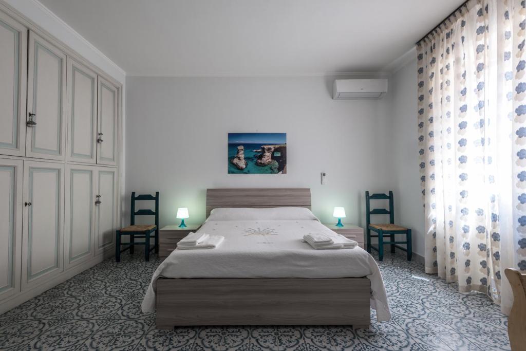 Postel nebo postele na pokoji v ubytování Suite della villa