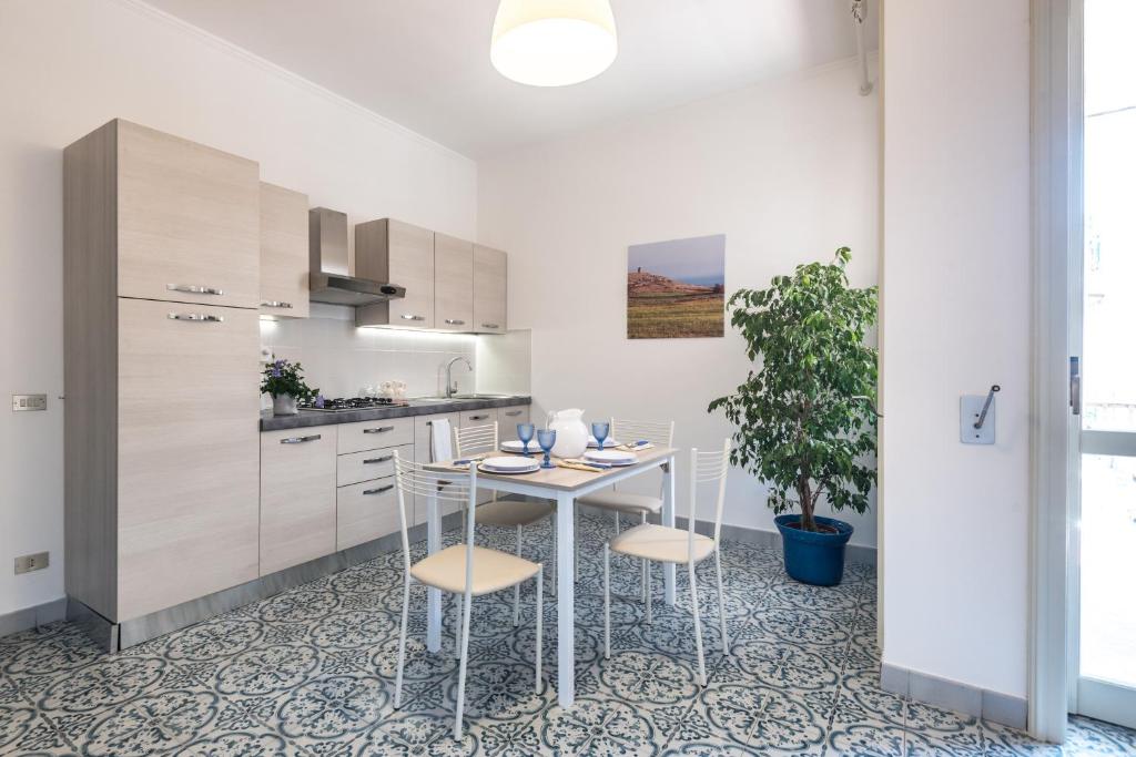 Kuchyň nebo kuchyňský kout v ubytování Suite della villa