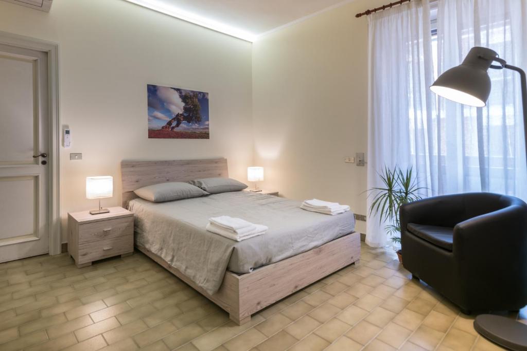 Postel nebo postele na pokoji v ubytování Suite della villa