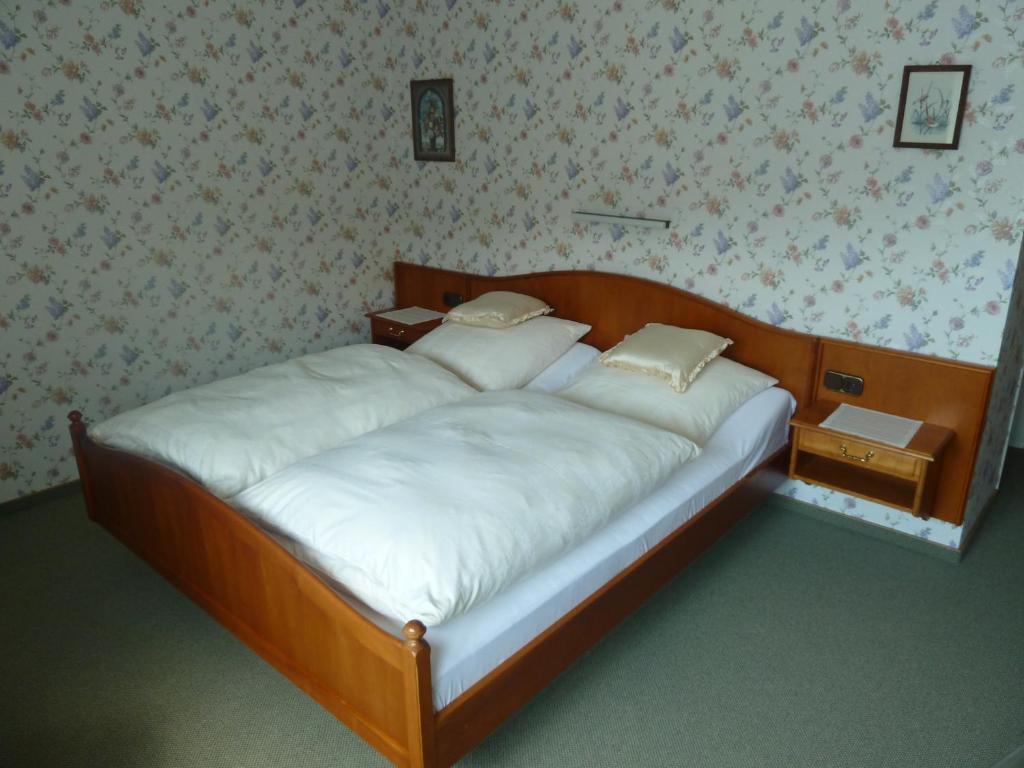 Postel nebo postele na pokoji v ubytování Gästehaus Fleck